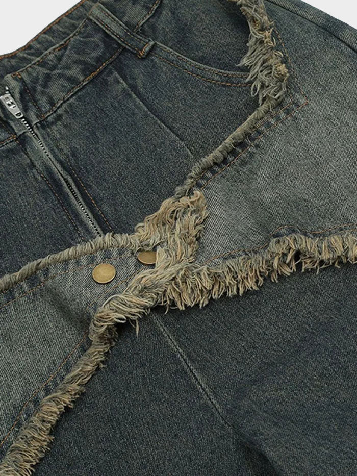 Flat lay of Y2K-style wide-leg denim jeans with distressed star patches and cargo pocket.
