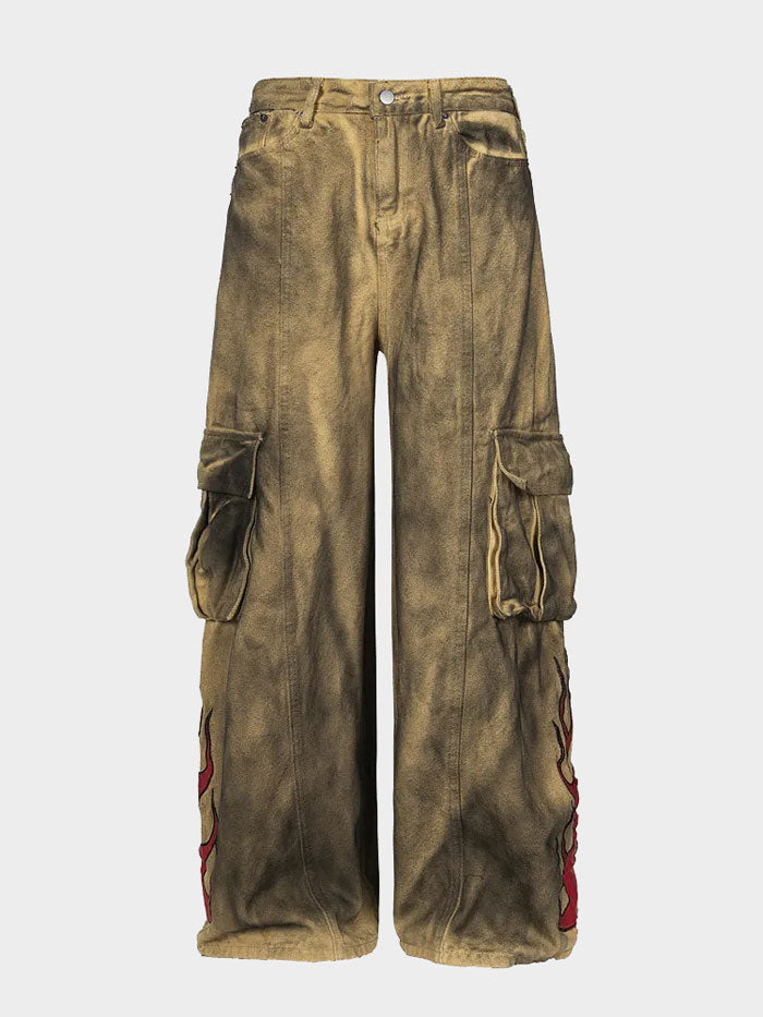 Vintage cargo jeans with flame embroidery on front legs.
