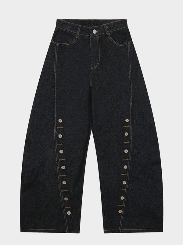 High-rise balloon-leg jeans in dark blue denim, styled in a streetwear outfit.