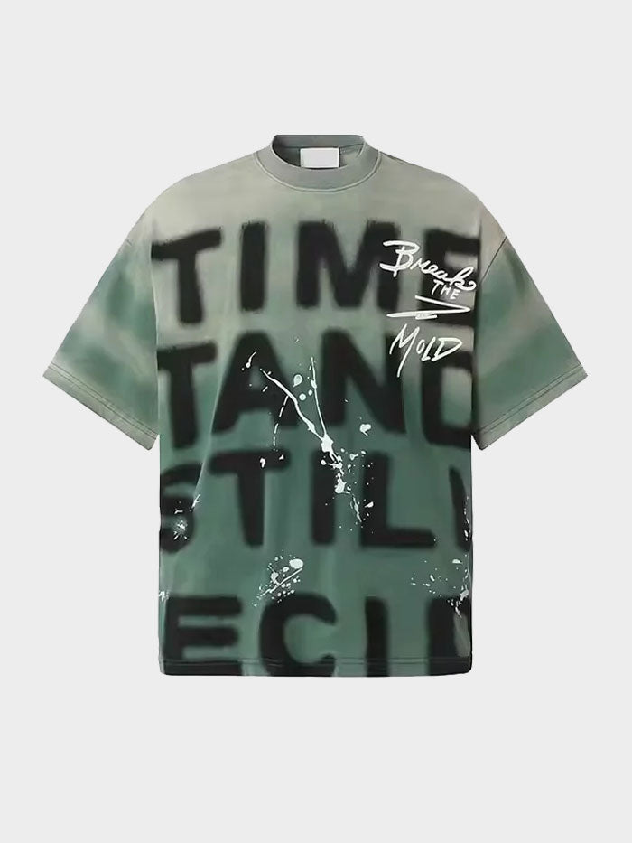Green streetwear T-shirt front with graffiti-style text and paint splatter graphics