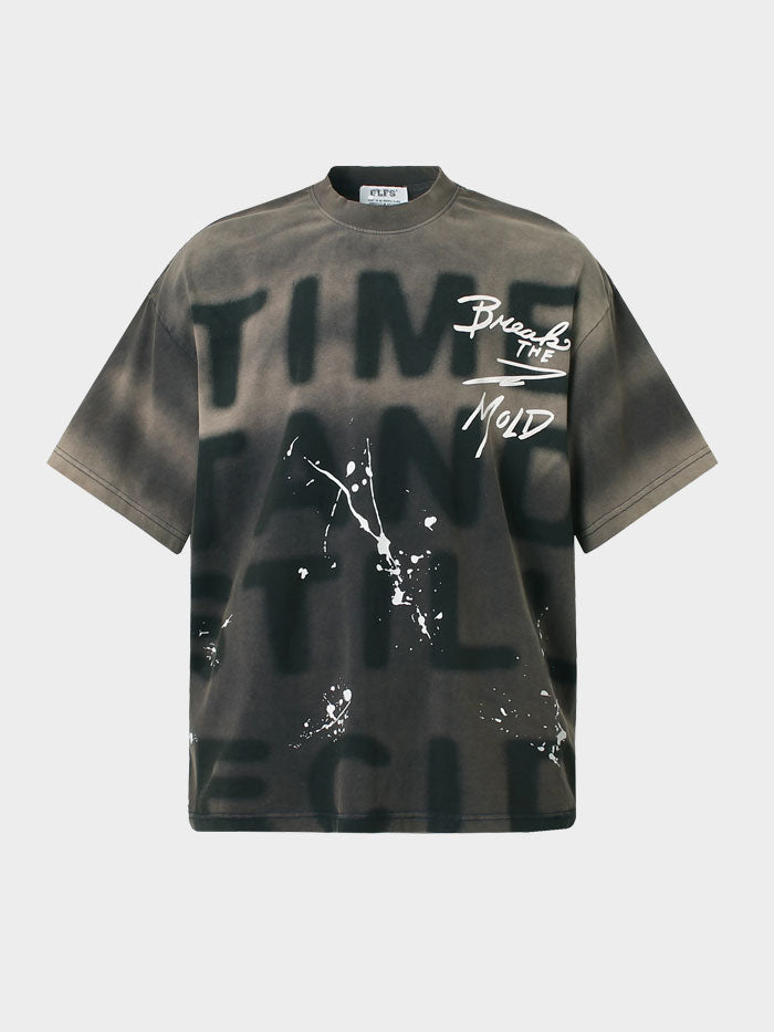 Front of black graffiti T-shirt with “Break the Mold” slogan and bold “Time Stand Still” lettering