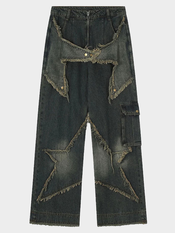 Side angle of wide-leg grunge jeans with a star patchwork detail and utility side pocket.