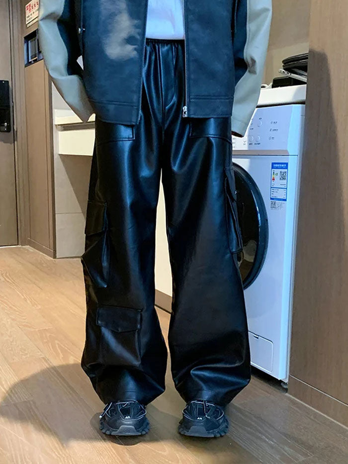 Unisex streetwear leather pants in a relaxed, wide-leg silhouette.