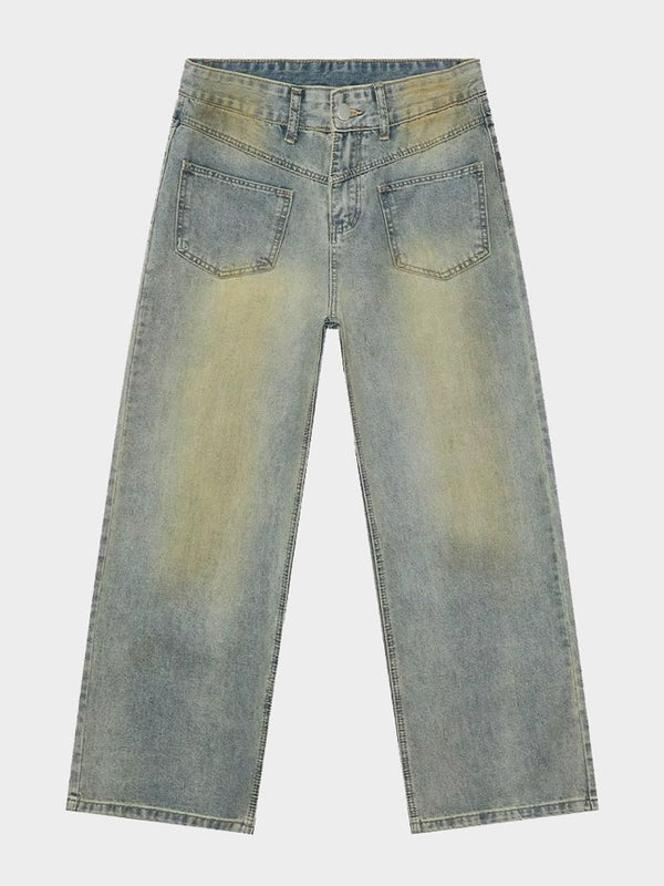 Flat lay of high-waisted wide-leg light-wash jeans with vintage fade detailing.