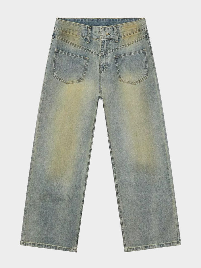 Flat lay of high-waisted wide-leg light-wash jeans with vintage fade detailing.