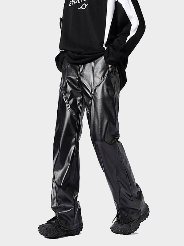 Men's shiny black leather pants styled with athletic top and sneakers