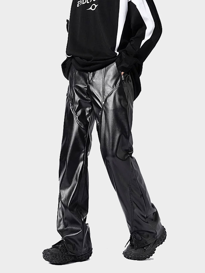 Men's shiny black leather pants styled with athletic top and sneakers