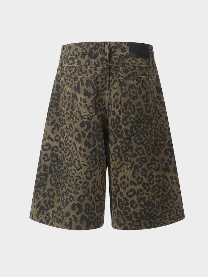 Back view showcasing dual pockets and full leopard pattern on baggy denim shorts.