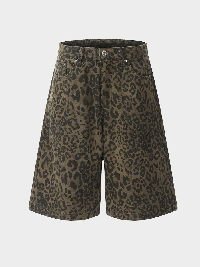Front view of wide-leg leopard print denim shorts with button closure.