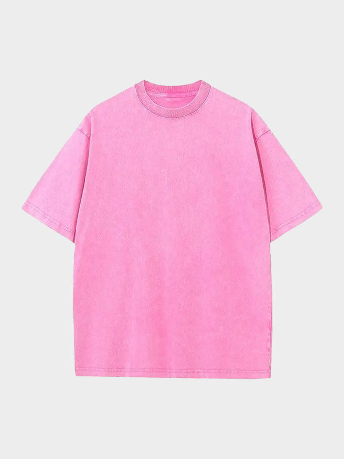 Oversized pink vintage wash t-shirt with relaxed fit and minimalist design