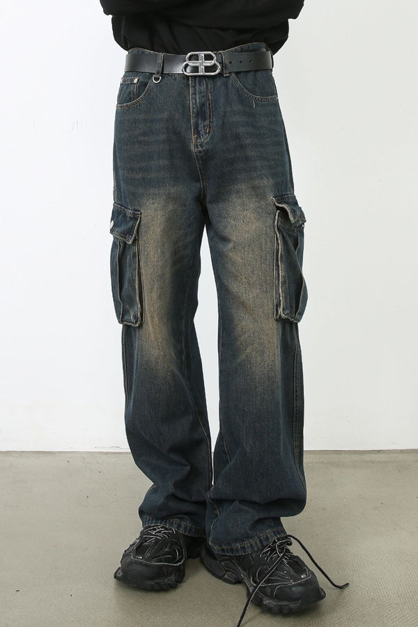 Front view of dark wash wide-leg cargo jeans with oversized pockets