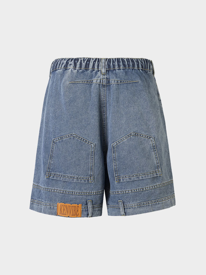 Back view of light-wash denim shorts featuring large patch pockets.