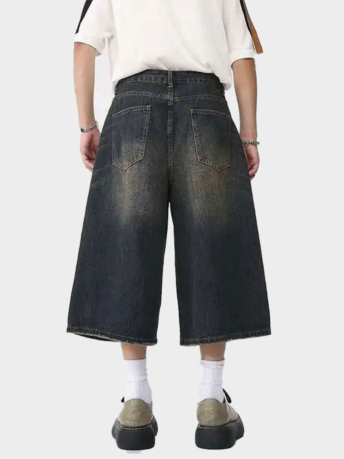 Back view of Looseywear wide-leg denim culottes with vintage-inspired pocket stitching.