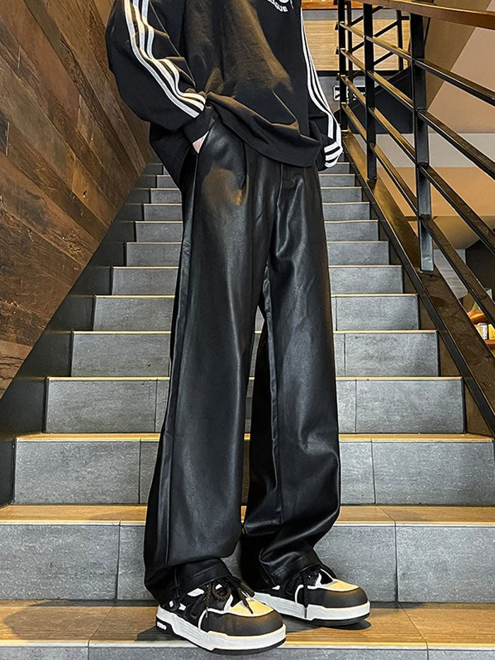 Streetwear style black leather cargo trousers for men with multiple pockets.