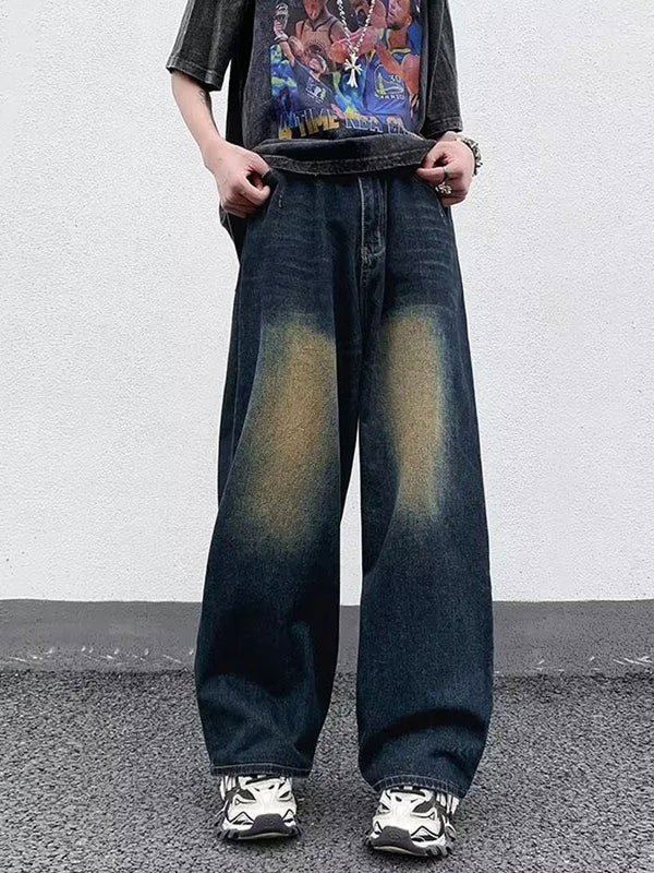 Model wearing vintage washed baggy jeans for men in a relaxed streetwear fit