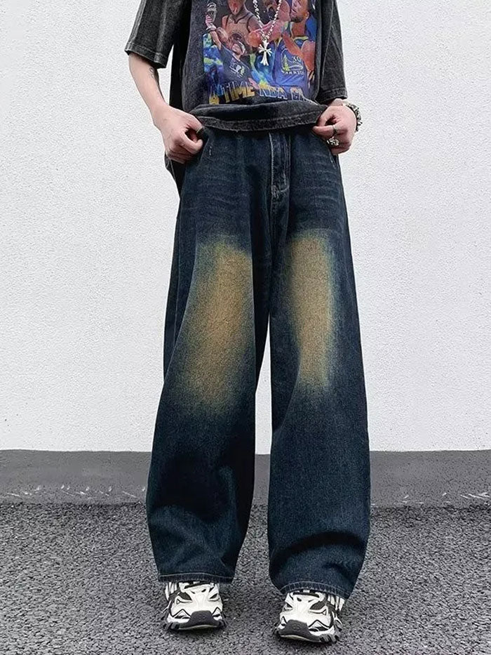 Model wearing vintage washed baggy jeans for men in a relaxed streetwear fit