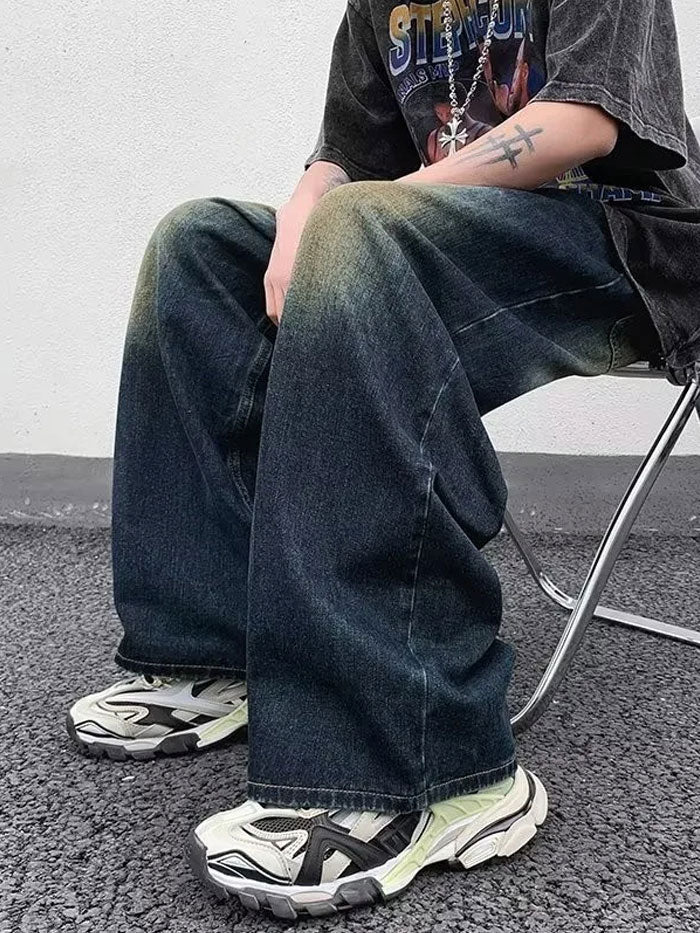 High-waisted wide leg jeans on male model styled for modern street fashion
