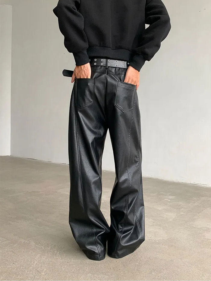 Matte finish black leather pants with subtle seam details.