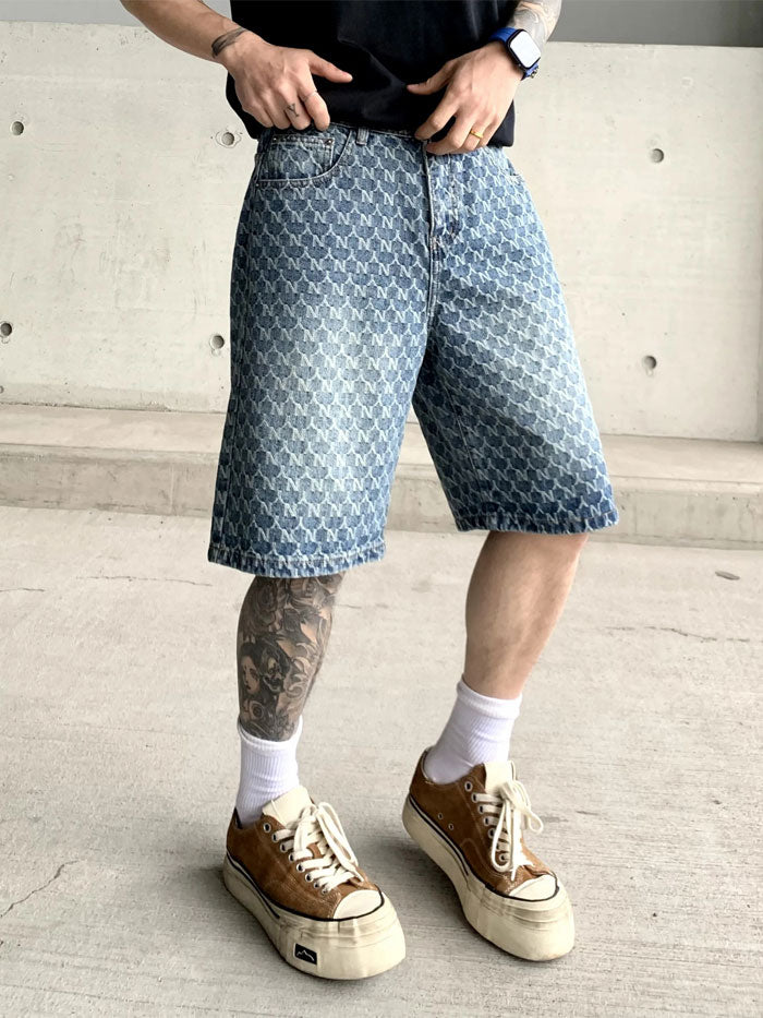Hip hop aesthetic blue faded denim shorts styled with white socks and brown sneakers