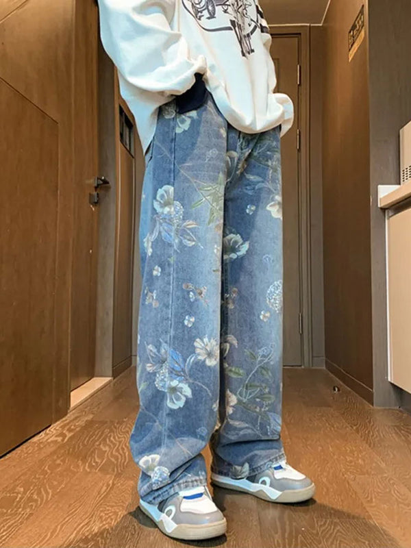 Floral wide-leg jeans styled with white oversized sweatshirt