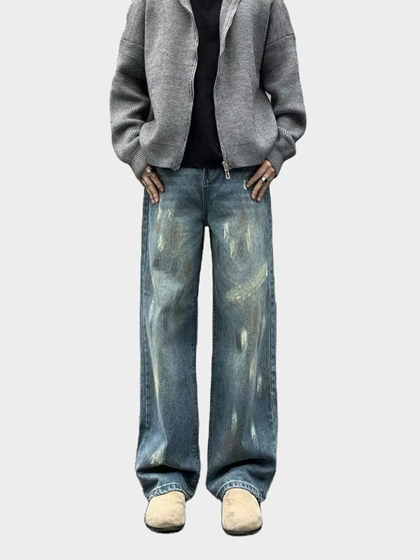 Front view of vintage wide-leg jeans styled with a black crop top.
