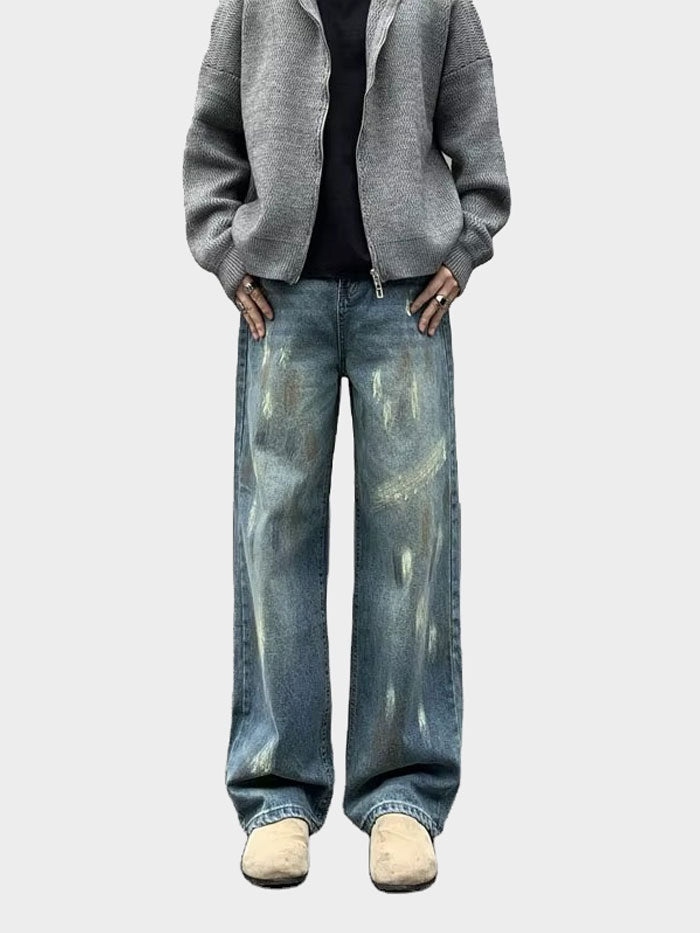 Front view of vintage wide-leg jeans styled with a black crop top.