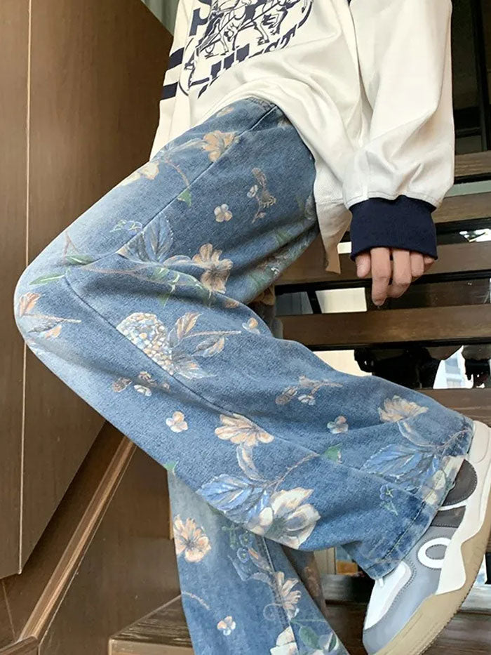 Back view of baggy blue jeans with floral design