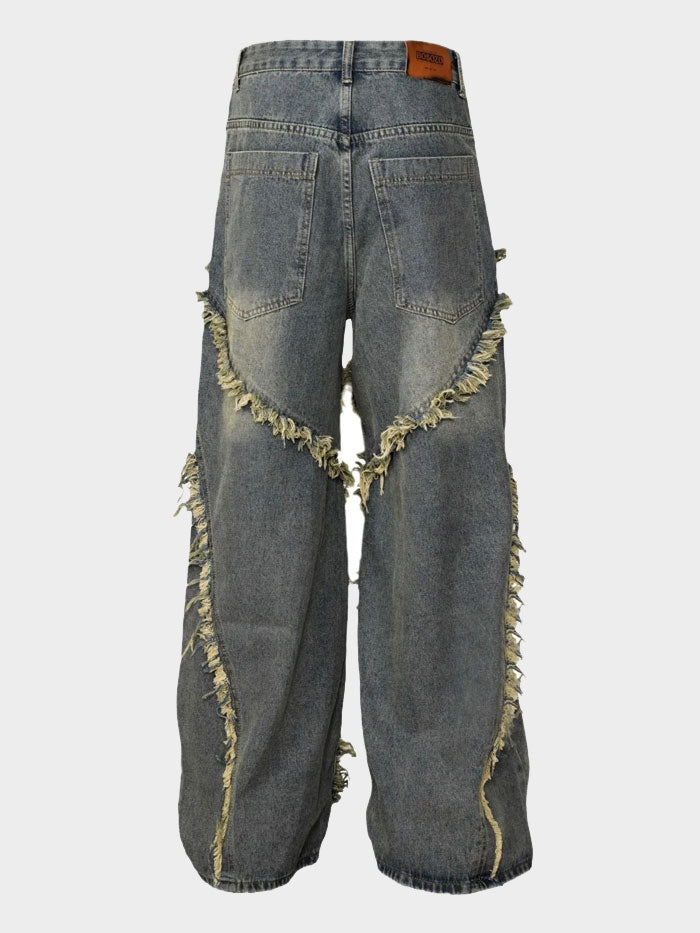 Back view of wide leg denim jeans with curved fringe detail and back pockets