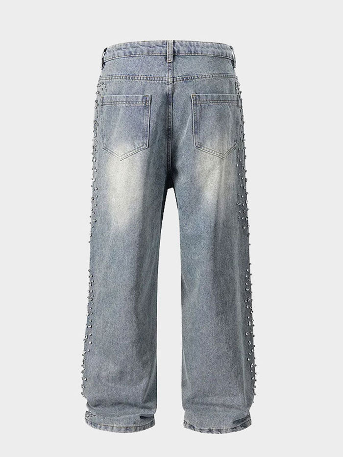 Back view of light blue wide-leg jeans featuring pearl accents and a relaxed fit.
