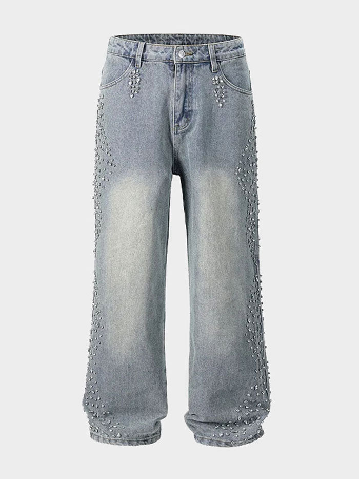 Front view of light wash wide-leg jeans with pearl embellishments for women.